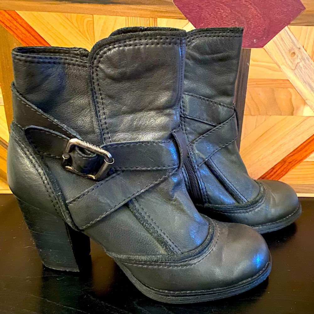Black heeled boots. Very comfortable only worn twice. Excellent condition.
